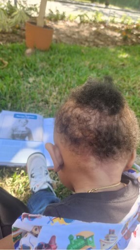 Child reading banned book